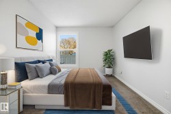 Carpeted bedroom with baseboards - 