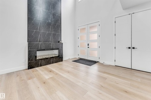 304 33 Avenue, Edmonton, AB - Indoor Photo Showing Other Room With Fireplace