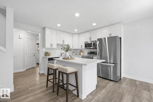 Virtually staged - 3609 Atkinson Loop, Edmonton, AB - Indoor Photo Showing Kitchen With Stainless Steel Kitchen With Upgraded Kitchen