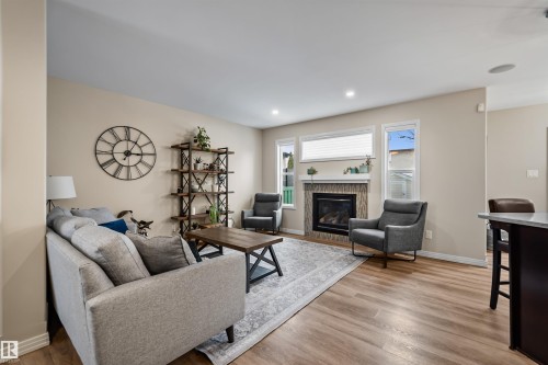 2349 Hagen Link Nw, Edmonton, AB - Indoor Photo Showing Living Room With Fireplace