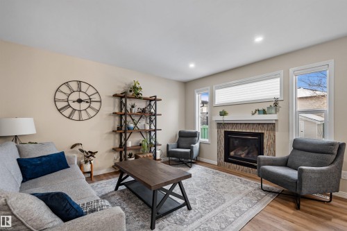 2349 Hagen Link Nw, Edmonton, AB - Indoor Photo Showing Living Room With Fireplace