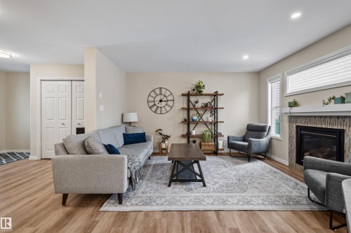 2349 Hagen Link Nw, Edmonton, AB - Indoor Photo Showing Living Room With Fireplace