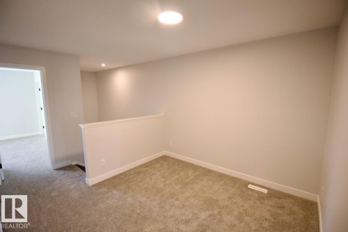 Upper 2232 Muckleplum Crescent Sw, Edmonton, AB - Indoor Photo Showing Other Room