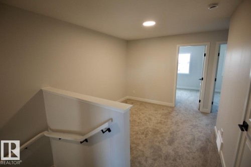 Upper 2232 Muckleplum Crescent Sw, Edmonton, AB - Indoor Photo Showing Other Room