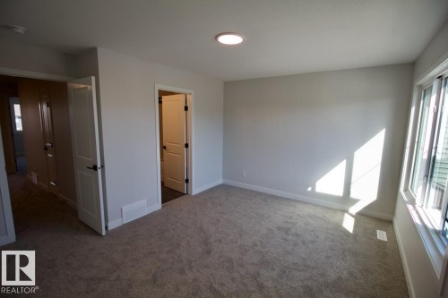 Upper 2232 Muckleplum Crescent Sw, Edmonton, AB - Indoor Photo Showing Other Room