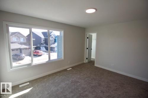 Upper 2232 Muckleplum Crescent Sw, Edmonton, AB - Indoor Photo Showing Other Room