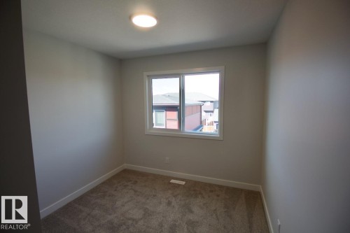 Upper 2232 Muckleplum Crescent Sw, Edmonton, AB - Indoor Photo Showing Other Room