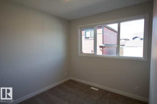 Upper 2232 Muckleplum Crescent Sw, Edmonton, AB - Indoor Photo Showing Other Room