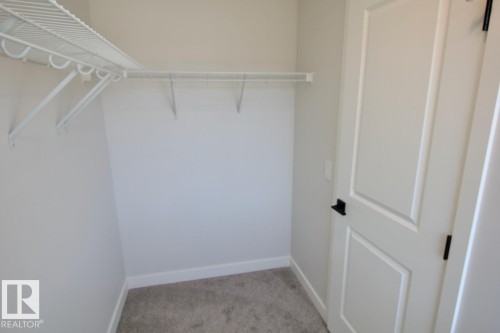 Upper 2232 Muckleplum Crescent Sw, Edmonton, AB - Indoor With Storage