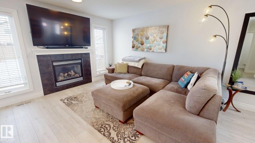 2057 69A Street, Edmonton, AB - Indoor Photo Showing Living Room With Fireplace