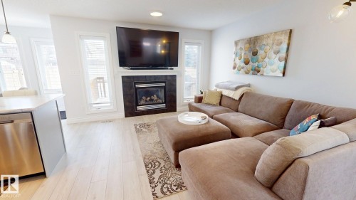 2057 69A Street, Edmonton, AB - Indoor Photo Showing Living Room With Fireplace