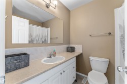 Full bathroom with vanity and a shower with curtain - 