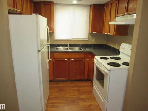 10831 80 Avenue, Edmonton, AB - Indoor Photo Showing Kitchen With Double Sink