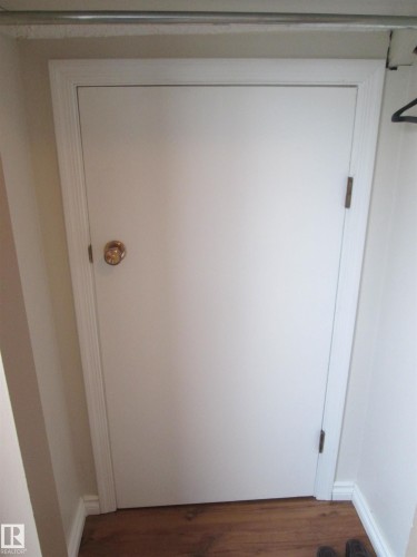 Detailed view of wood finished floors - 10831 80 Avenue, Edmonton, AB - Indoor Photo Showing Other Room