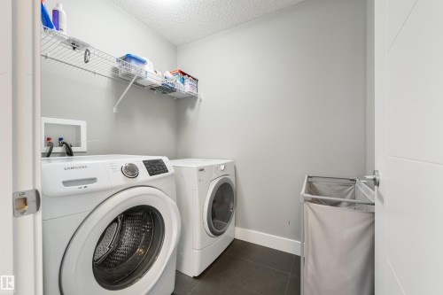 60 Vanderbilt Common, Spruce Grove, AB - Indoor Photo Showing Laundry Room