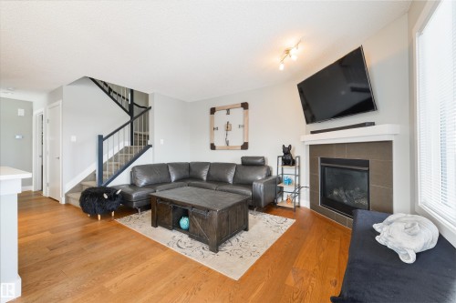 60 Vanderbilt Common, Spruce Grove, AB - Indoor Photo Showing Living Room With Fireplace