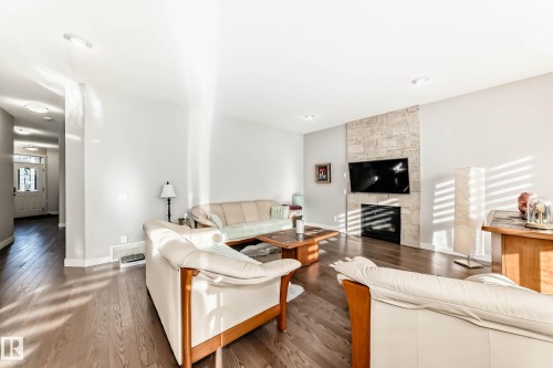 7719 Getty Wynd, Edmonton, AB - Indoor Photo Showing Living Room With Fireplace