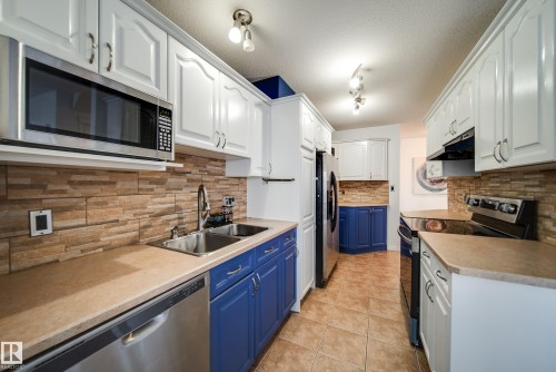 3716 160A Avenue, Edmonton, AB - Indoor Photo Showing Kitchen With Double Sink