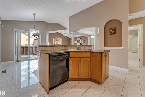 3331 26 Street, Edmonton, AB - Indoor Photo Showing Kitchen With Double Sink