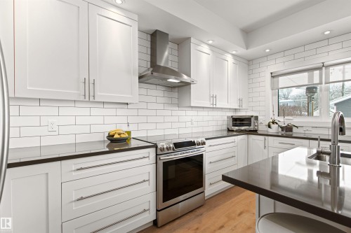Edmonton, AB - Indoor Photo Showing Kitchen With Upgraded Kitchen
