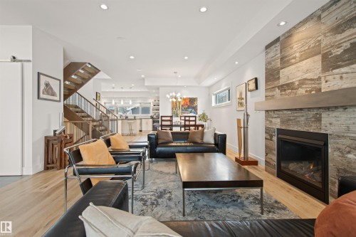 Edmonton, AB - Indoor Photo Showing Living Room With Fireplace