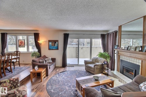 1035 109 Street, Edmonton, AB - Indoor Photo Showing Living Room With Fireplace