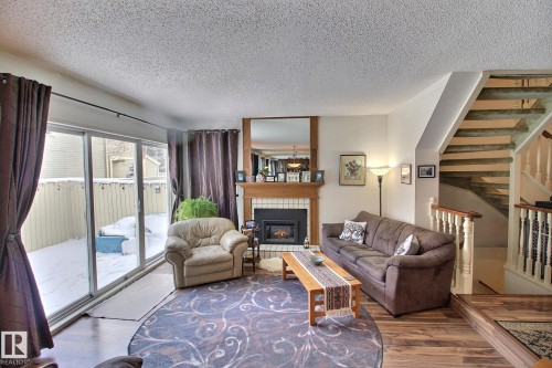 1035 109 Street, Edmonton, AB - Indoor Photo Showing Living Room With Fireplace