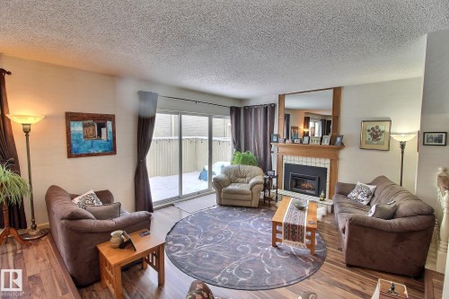 1035 109 Street, Edmonton, AB - Indoor Photo Showing Living Room With Fireplace