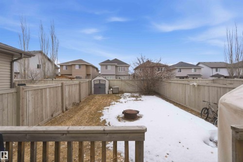 The property features a fenced backyard with a shed - 2037 69A Street, Edmonton, AB - Outdoor With Exterior