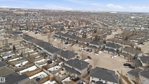 Aerial view showcasing the residential area with various property types and well-maintained streets - 2037 69A Street, Edmonton, AB - Outdoor With View