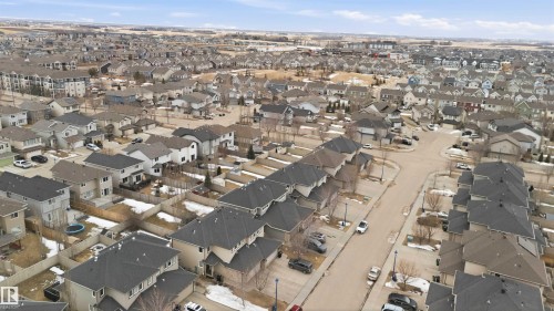 An aerial view showcasing a well-established residential neighborhood with a variety of property styles and mature landscaping - 2037 69A Street, Edmonton, AB - Outdoor With View