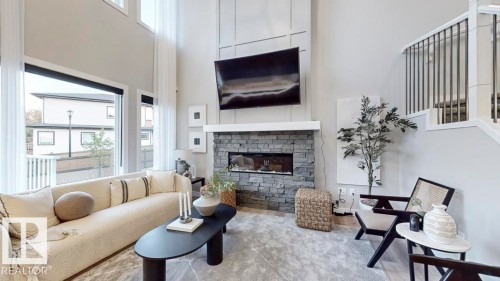 5009 Cawsey Link, Edmonton, AB - Indoor Photo Showing Living Room With Fireplace