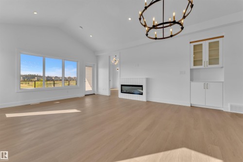 164 Caledon Crescent, Spruce Grove, AB - Indoor Photo Showing Other Room With Fireplace