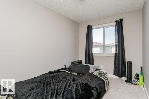 20 2004 Trumpeter Way, Edmonton, AB - Indoor Photo Showing Bedroom