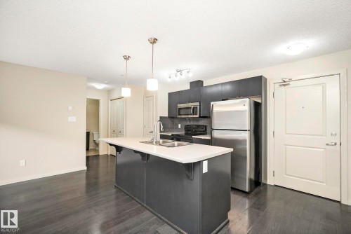 112 340 Windermere Road, Edmonton, AB - Indoor Photo Showing Kitchen With Stainless Steel Kitchen With Double Sink