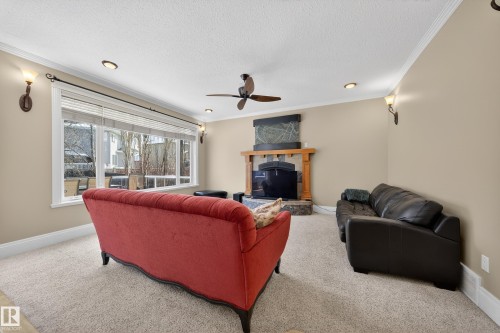 27 Kingdom Place, Leduc, AB - Indoor Photo Showing Living Room With Fireplace