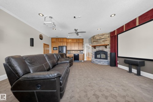 27 Kingdom Place, Leduc, AB - Indoor Photo Showing Living Room With Fireplace
