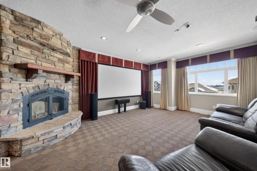 27 Kingdom Place, Leduc, AB - Indoor Photo Showing Living Room With Fireplace
