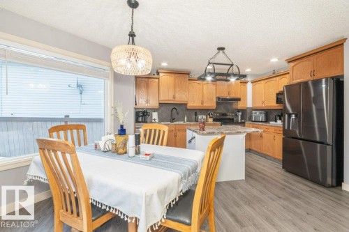 41 Pointe Masson, Beaumont, AB - Indoor Photo Showing Dining Room
