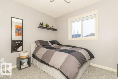 41 Pointe Masson, Beaumont, AB - Indoor Photo Showing Bedroom