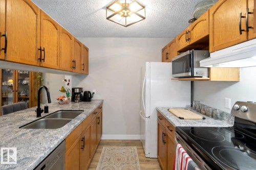 329 17447 98A Avenue, Edmonton, AB - Indoor Photo Showing Kitchen With Double Sink