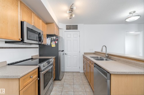 306 6921 199 Street, Edmonton, AB - Indoor Photo Showing Kitchen With Double Sink