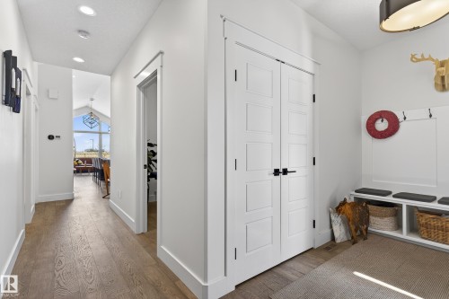 The property features modern hardwood flooring, white walls, and recessed lighting - 45 Evermore Crescent, St. Albert, AB - Indoor Photo Showing Other Room