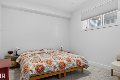 The property features a room with light gray carpeting and white walls, complete with a window - 45 Evermore Crescent, St. Albert, AB - Indoor Photo Showing Bedroom