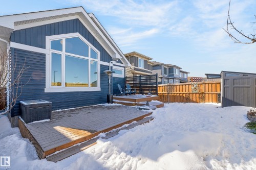 The property features an outdoor deck with steps, a fenced yard, and a shed - 45 Evermore Crescent, St. Albert, AB - Outdoor