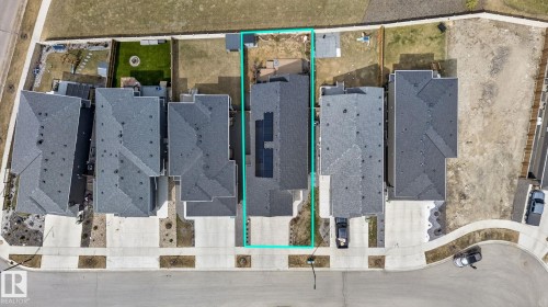 Aerial perspective of a detached residence featuring a dark shingle roof and a dedicated driveway - 45 Evermore Crescent, St. Albert, AB - Other