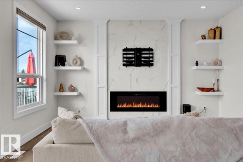 9327 181 Avenue, Edmonton, AB - Indoor Photo Showing Living Room With Fireplace