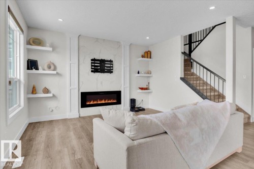 9327 181 Avenue, Edmonton, AB - Indoor Photo Showing Living Room With Fireplace