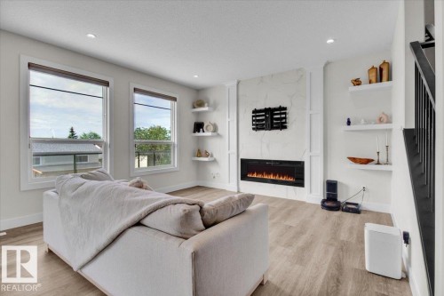 9327 181 Avenue, Edmonton, AB - Indoor Photo Showing Living Room With Fireplace
