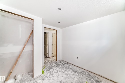 Interior space with white walls and an untextured ceiling - 22407 99 Avenue, Edmonton, AB - Indoor Photo Showing Other Room